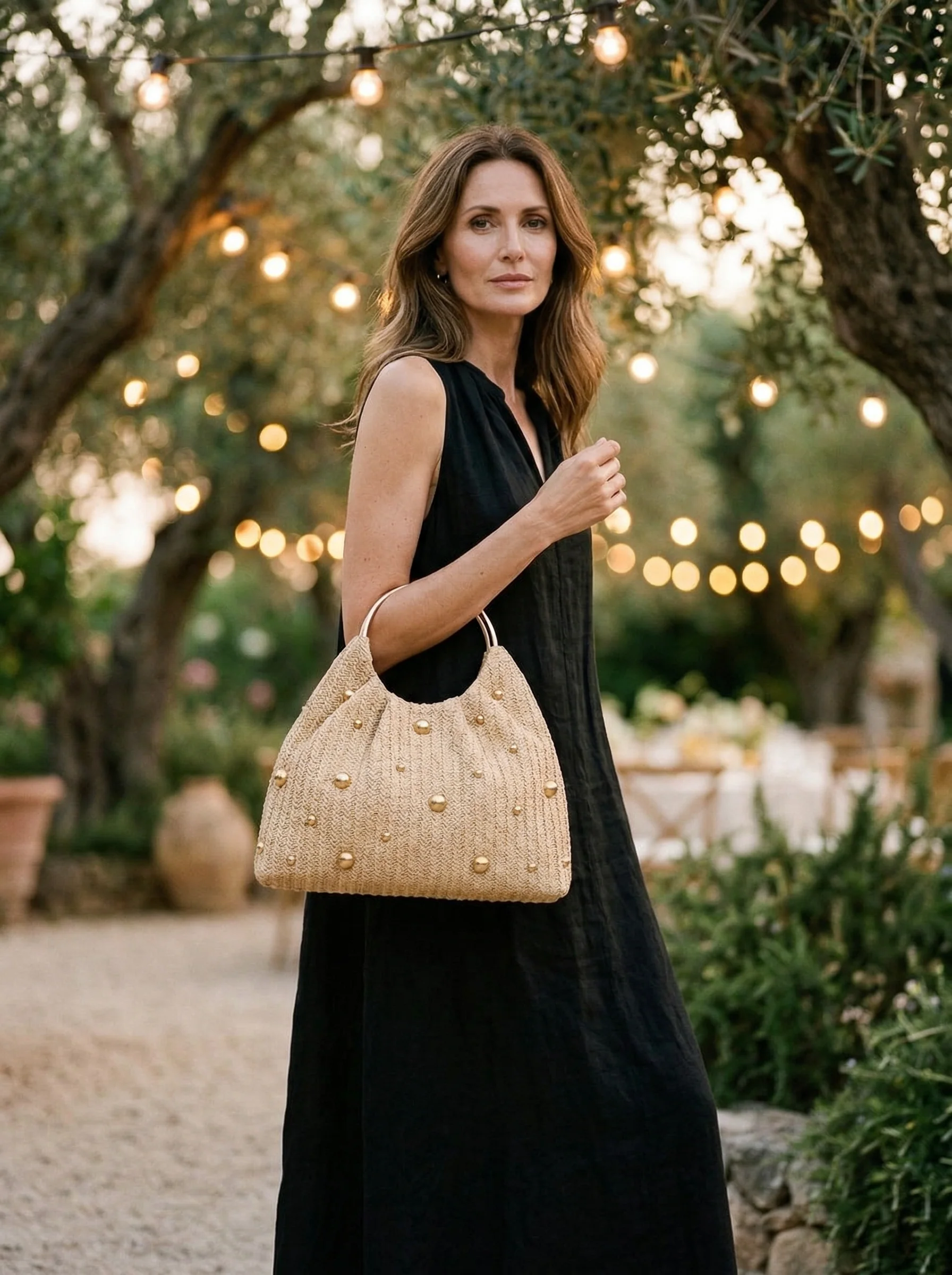 Artisanal Studded Handwoven Raffia Bag with Sculptural Gold Ring Handle - Image 2